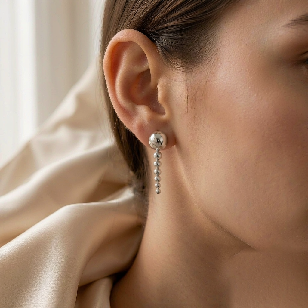 Comet Drop Earrings — Silver — worn view