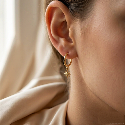 VARYNOXA Cosmic Huggie Hoop Earrings — worn view