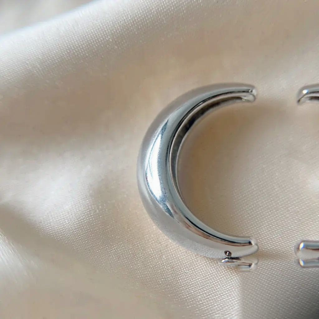 Crescent Hoop Earrings — Silver — macro view