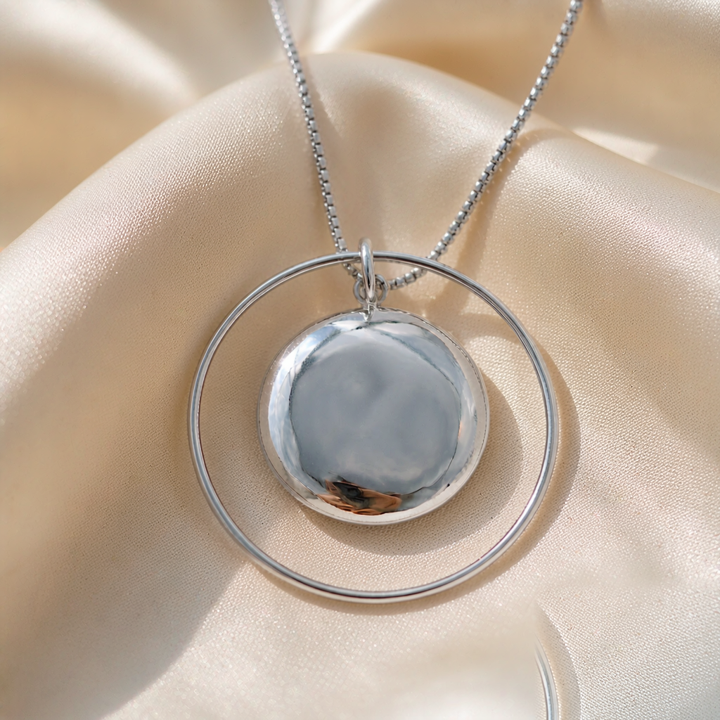 Orbit Satellite Pendant Necklace — Silver — macro view