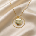 VARYNOXA Orbit Satellite Pendant Necklace — studio view