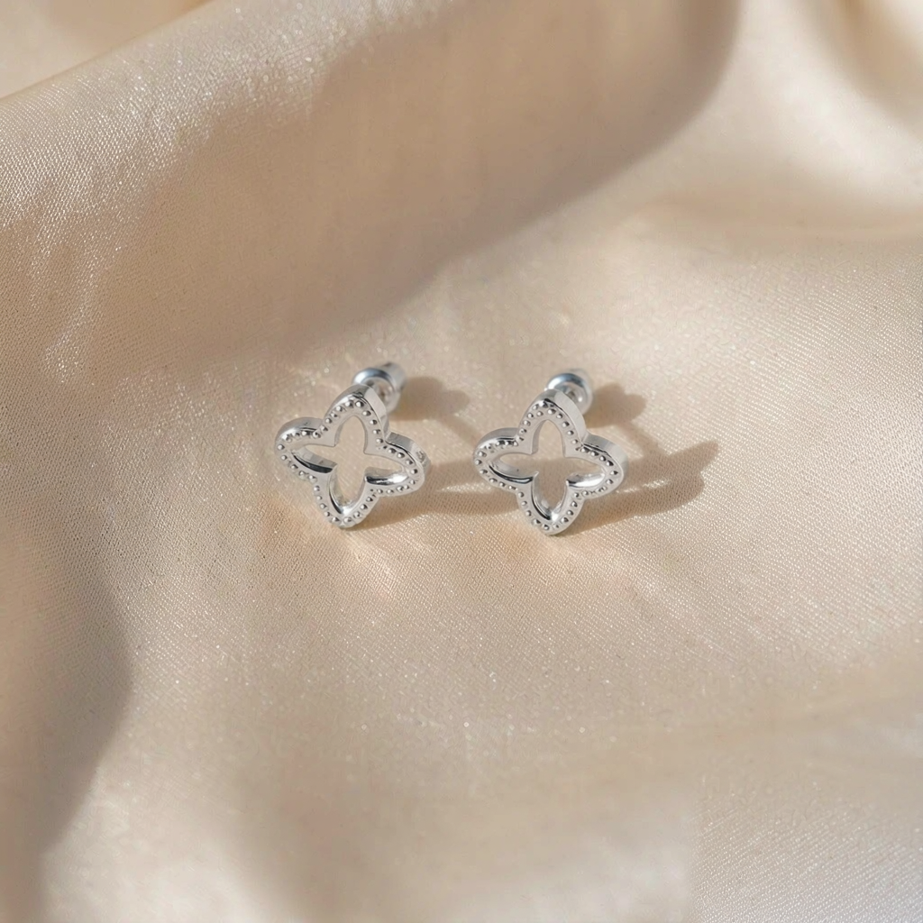 Stella Star Stud Earrings — Silver — studio view