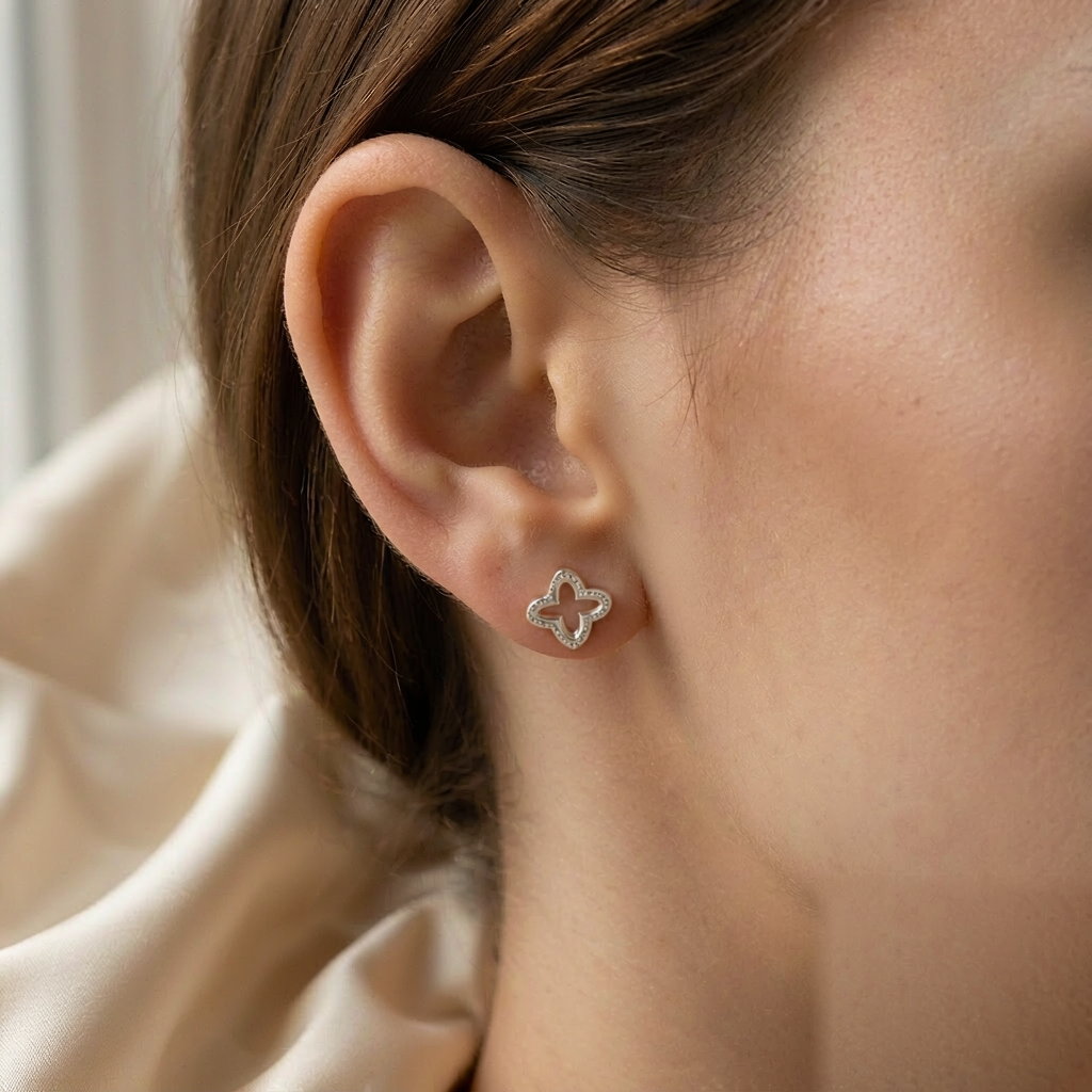Stella Star Stud Earrings — Silver — worn view